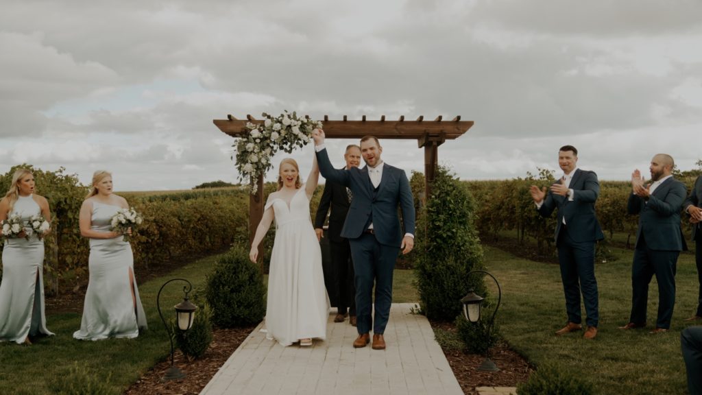 bride reading vows at harpor's vinyard, ames, iowa, west branch, des moines wedding videographer, iowa wedding videographer, iowa wedding videographer tips